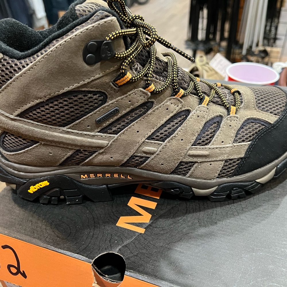 Merrell Brown and Black Athletic Shoes with Rugged Design
